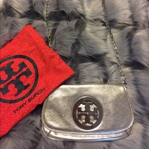 Tory Burch 100% authentic. Used for only one time